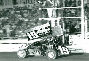 Steve Smith takes the checkered flag in the Inaugural Thunder on the Hill Event in August of 1990 (Photo Courtesy of Area Auto Racing News)